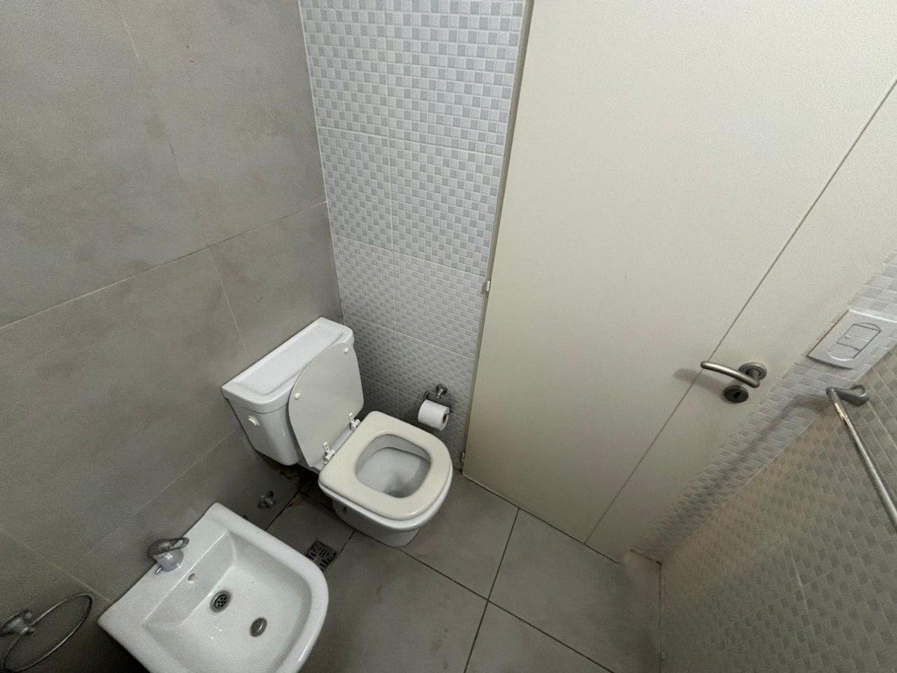 Impecable departamento de 2 ambientes con cochera cubierta - San Martin Centro